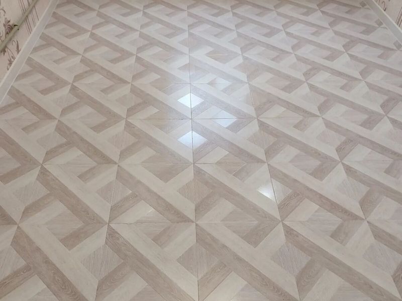 Ceramic floor tile with a parquet-look pattern