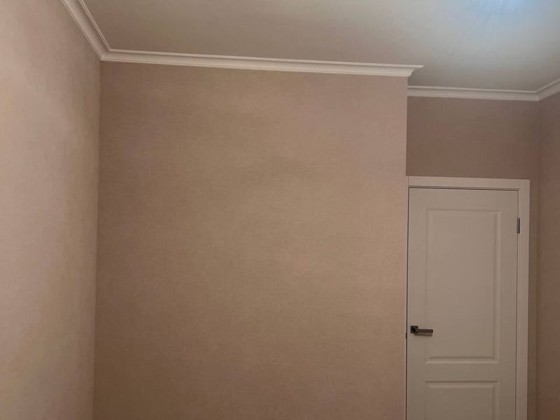 Smooth walls after the final skim coat in a Prague flat