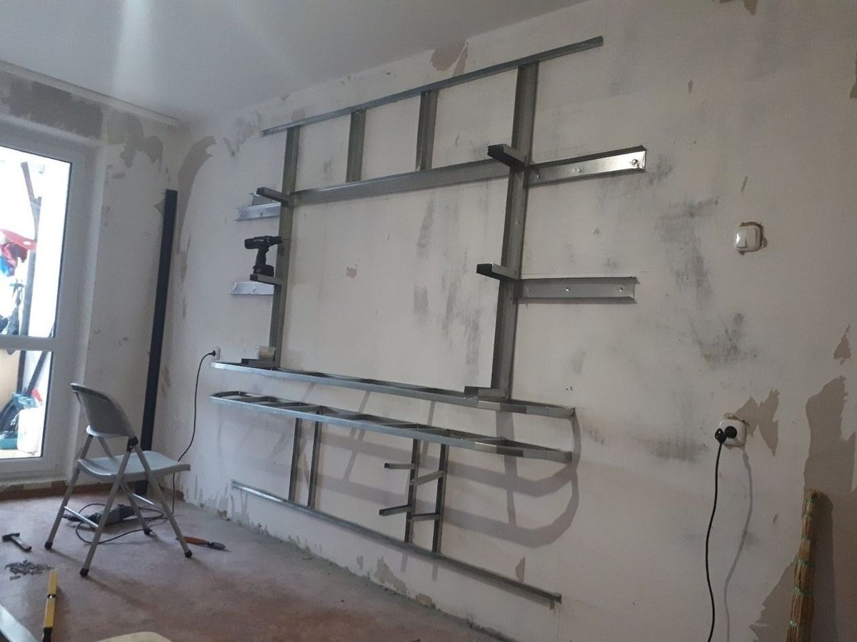 Metal frame of a TV wall during construction