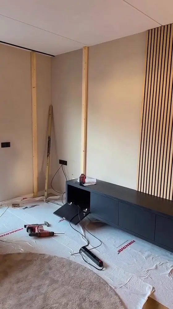 Living room with a fireplace wall